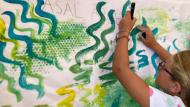 Porquerisses: Pintant el mural  Abigail Gómez